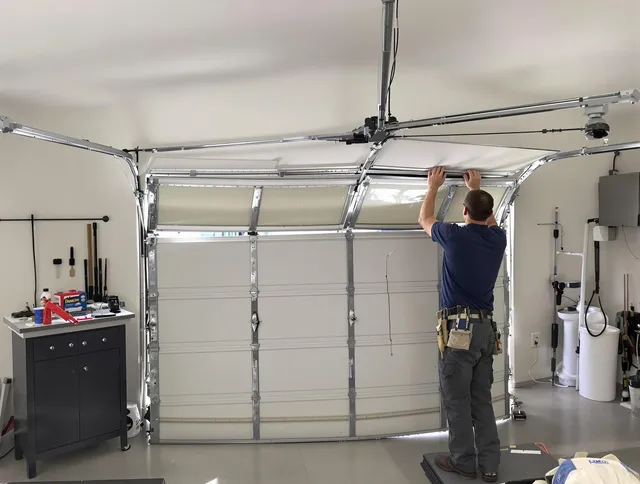 Bradenton Garage Door Repair specialist performing precise section replacement on Bradenton garage door